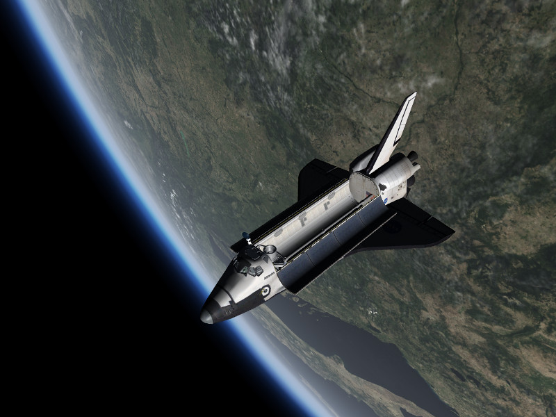 space shuttle flying